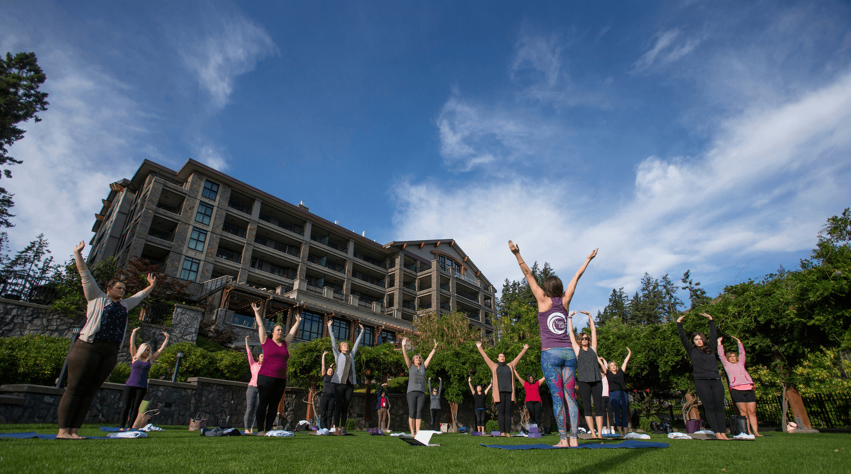 women doing yoga outside