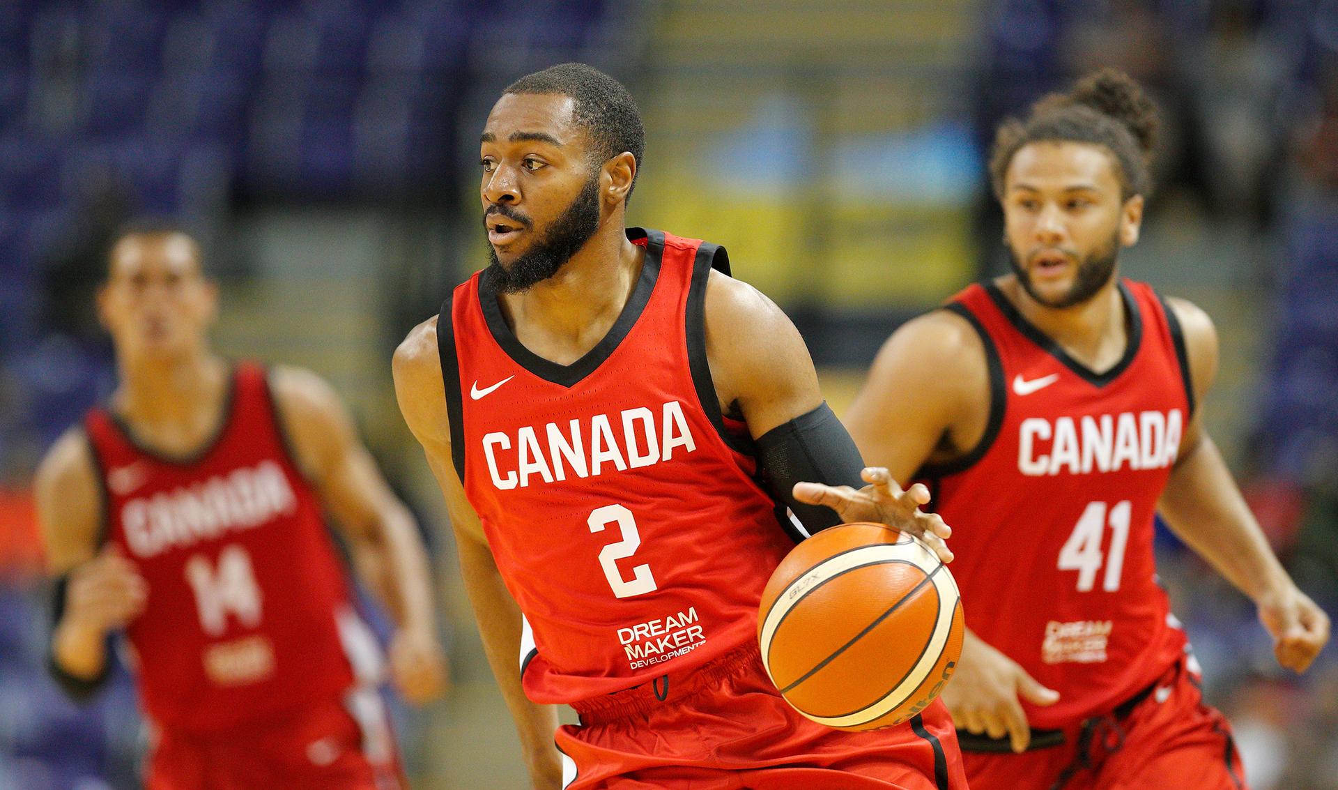 Men playing basketball