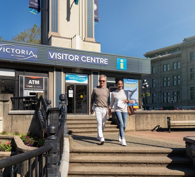 downtown A nested independent couple visits the Victoria Visitor Centre